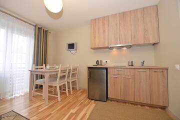 Фото номера Апартаменты с балконом Апартаменты Palangos Vila Apartments г. Паланга 10