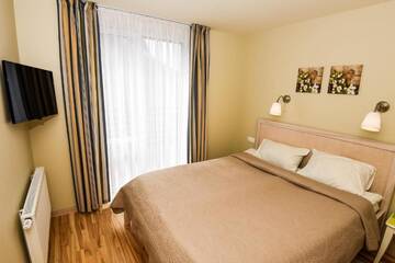 Фото номера Апартаменты с балконом Апартаменты Palangos Vila Apartments г. Паланга 14
