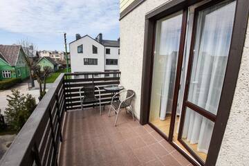 Фото номера Апартаменты с балконом Апартаменты Palangos Vila Apartments г. Паланга 25