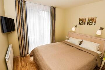 Фото номера Апартаменты с балконом Апартаменты Palangos Vila Apartments г. Паланга 4