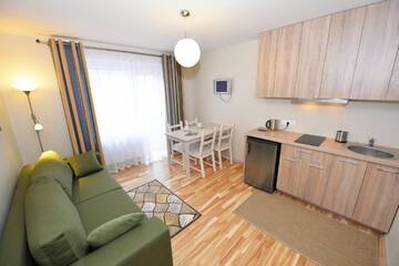 Фото номера Апартаменты с балконом Апартаменты Palangos Vila Apartments г. Паланга 5