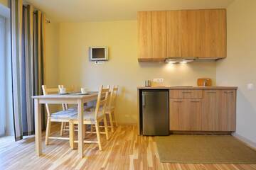 Фото номера Апартаменты с балконом Апартаменты Palangos Vila Apartments г. Паланга 7