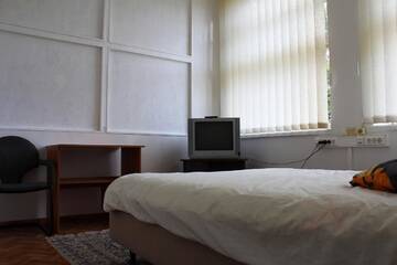 Фото номера Двухместный номер с 1 кроватью или 2 отдельными кроватями, общая ванная комната Гостевой дом Palangos Kopa г. Паланга 10