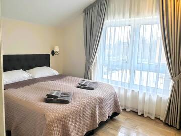Фото номера Семейный полулюкс Апартаменты Apartamentai Amber drop г. Паланга 6