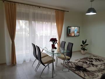 Фото номера Апартаменты с террасой Апартаменты Apartamentai "Nadiežda" г. Паланга 18