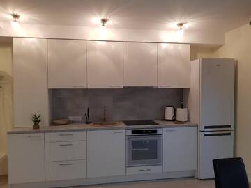 Фото номера Апартаменты с террасой Апартаменты Apartamentai "Nadiežda" г. Паланга 14