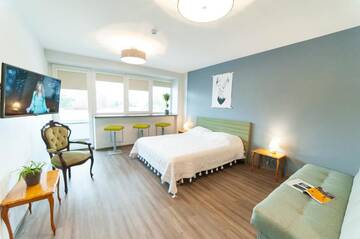 Фото номера Семейный номер с балконом Хостелы Symbiosis Hostel г. Паланга 7
