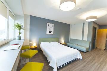 Фото номера Семейный номер с балконом Хостелы Symbiosis Hostel г. Паланга 4
