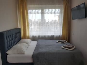 Фото номера Трехместный номер с общей ванной комнатой Гостевой дом Loreta2 г. Паланга 3