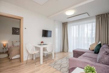 Фото номера Апартаменты с балконом Апартаменты Apartament Malūno г. Паланга 37