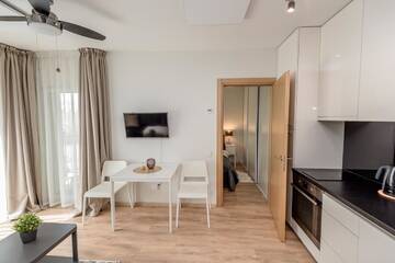 Фото номера Апартаменты с видом на бассейн Апартаменты Apartament Malūno г. Паланга 5