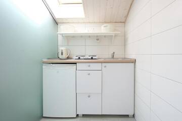 Фото номера Семейный номер-студио Апартаменты PH Palanga Apartments г. Паланга 7