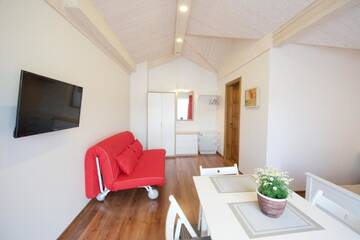 Фото номера Семейный номер-студио Апартаменты PH Palanga Apartments г. Паланга 6