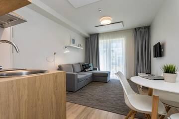 Фото номера Апартаменты с видом на бассейн Апартаменты Malūnų Vilų apartamentai г. Паланга 9