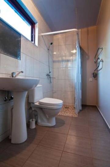 Фото номера Дом для отпуска с 1 спальней Апартаменты Guest House Darius ir Girėnas г. Паланга 7
