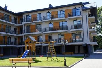 Фото номера Трехместный номер с балконом Апартаменты 365 Inn Apartments Malūno Vilos г. Паланга 42