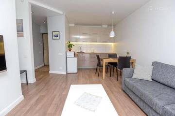 Фото номера Трехместный номер с балконом Апартаменты 365 Inn Apartments Malūno Vilos г. Паланга 56