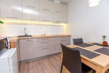 Фото номера Трехместный номер с балконом Апартаменты 365 Inn Apartments Malūno Vilos г. Паланга 53