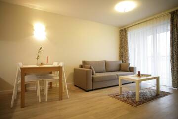 Фото номера Трехместный номер с балконом Апартаменты 365 Inn Apartments Malūno Vilos г. Паланга 15