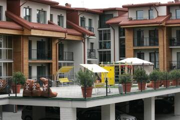Фото номера Трехместный номер с балконом Апартаменты 365 Inn Apartments Malūno Vilos г. Паланга 29