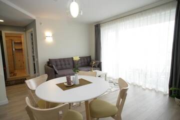 Фото номера Трехместный номер с балконом Апартаменты 365 Inn Apartments Malūno Vilos г. Паланга 24