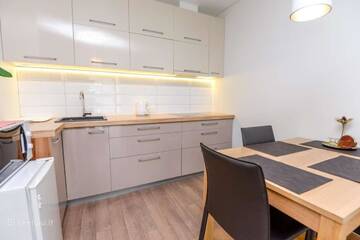 Фото номера Трехместный номер с балконом Апартаменты 365 Inn Apartments Malūno Vilos г. Паланга 7