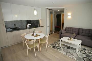 Фото номера Трехместный номер с балконом Апартаменты 365 Inn Apartments Malūno Vilos г. Паланга 36