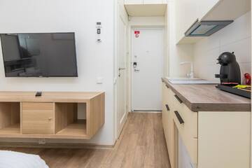Фото номера Номер-студио с кроватью размера &quot;king-size&quot; Апартаменты E Mini Studio г. Паланга 11