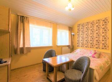 Фото номера Улучшенный двухместный номер с 1 кроватью Гостевой дом Neringa Guest House г. Паланга 3
