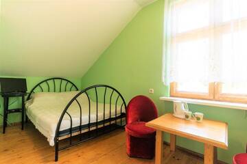 Фото номера Двухместный номер эконом-класса с 1 кроватью Гостевой дом Neringa Guest House г. Паланга 3