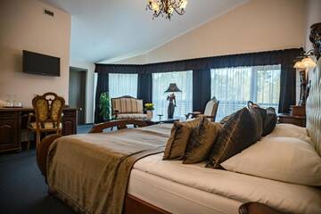 Фото номера Апартаменты с возможностью посещения спа-салона. Отель Atostogų Parkas Hotel г. Паланга 5