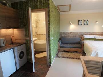 Фото номера Номер-студио с джакузи Апартаменты Apartments Ąžuolas г. Паланга 13