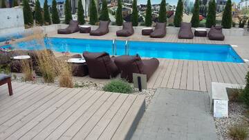 Фото номера Апартаменты с видом на бассейн Апартаменты Malūnų Apartamentai г. Паланга 18