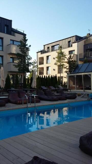 Фото номера Апартаменты с видом на бассейн Апартаменты Malūnų Apartamentai г. Паланга 20