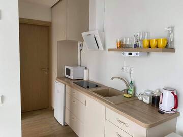 Фото номера Апартаменты с видом на бассейн Апартаменты Malūnų Apartamentai г. Паланга 7