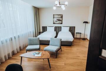 Фото номера Апартаменты с 2 спальнями Апарт-отели Žilvinas Hotel г. Паланга 4