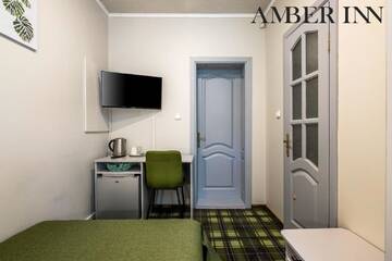Фото номера Стандартный одноместный номер Гостевой дом Amber Inn г. Паланга 4
