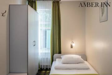 Фото номера Стандартный одноместный номер Гостевой дом Amber Inn г. Паланга 5
