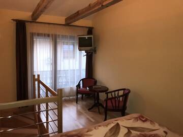 Фото номера Двухуровневые апартаменты Апарт-отели Vila Saulė г. Паланга 7