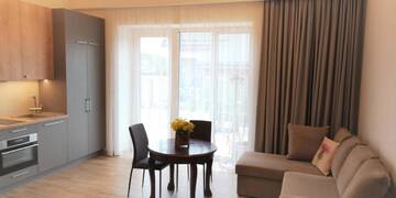 Фото номера Семейный номер с террасой Апартаменты Sea 4 You Apartments г. Паланга 2