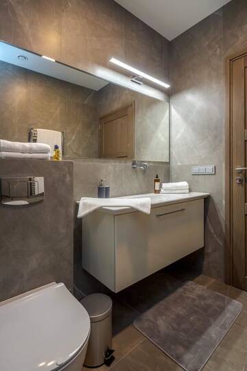 Фото номера Апартаменты с 2 спальнями Апартаменты Vanagupes Luxury Cottages г. Паланга 20