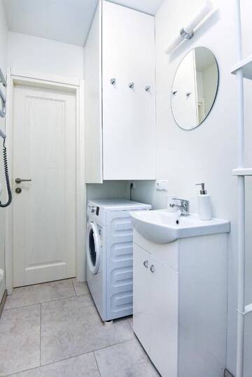 Фото номера Апартаменты с 1 спальней Апартаменты Palanga Vaivorykštės APARTMENT г. Паланга 12
