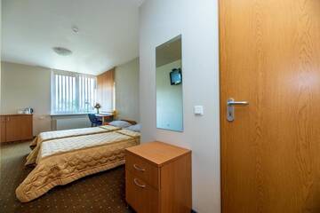 Фото номера Двухместный номер с 2 отдельными кроватями Гостевой дом Apartamentai "Tenisas" г. Паланга 13