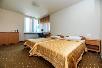 Фото номера Двухместный номер с 2 отдельными кроватями Гостевой дом Apartamentai "Tenisas" г. Паланга 2