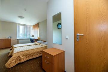 Фото номера Двухместный номер с 2 отдельными кроватями Гостевой дом Apartamentai "Tenisas" г. Паланга 4
