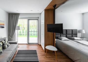 Фото номера Трехместный номер с террасой Гостевой дом VILLA AIDO г. Паланга 6