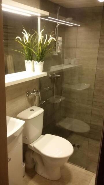 Фото номера Апартаменты с 1 спальней Апартаменты Maluno Vilos Penthouse г. Паланга 25