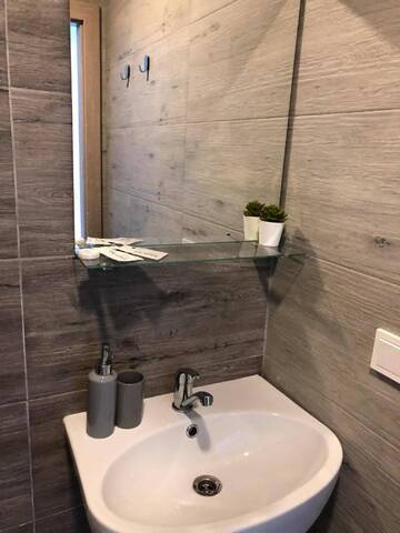 Фото номера Двухместный номер с 1 кроватью Гостевой дом Izabelės apartamentai г. Паланга 7