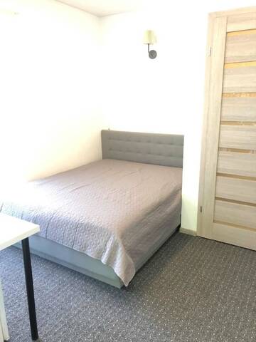 Фото номера Двухместный номер с 1 кроватью и террасой Гостевой дом Izabelės apartamentai г. Паланга 9