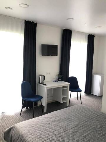 Фото номера Стандартный двухместный люкс с 1 кроватью Гостевой дом Izabelės apartamentai г. Паланга 12